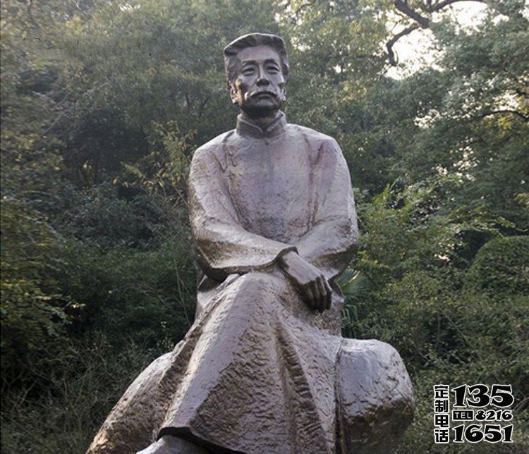 玻璃钢公园景观人物坐在石头上的鲁迅雕塑 玻璃钢公园景观人物坐在石头上的鲁迅雕塑